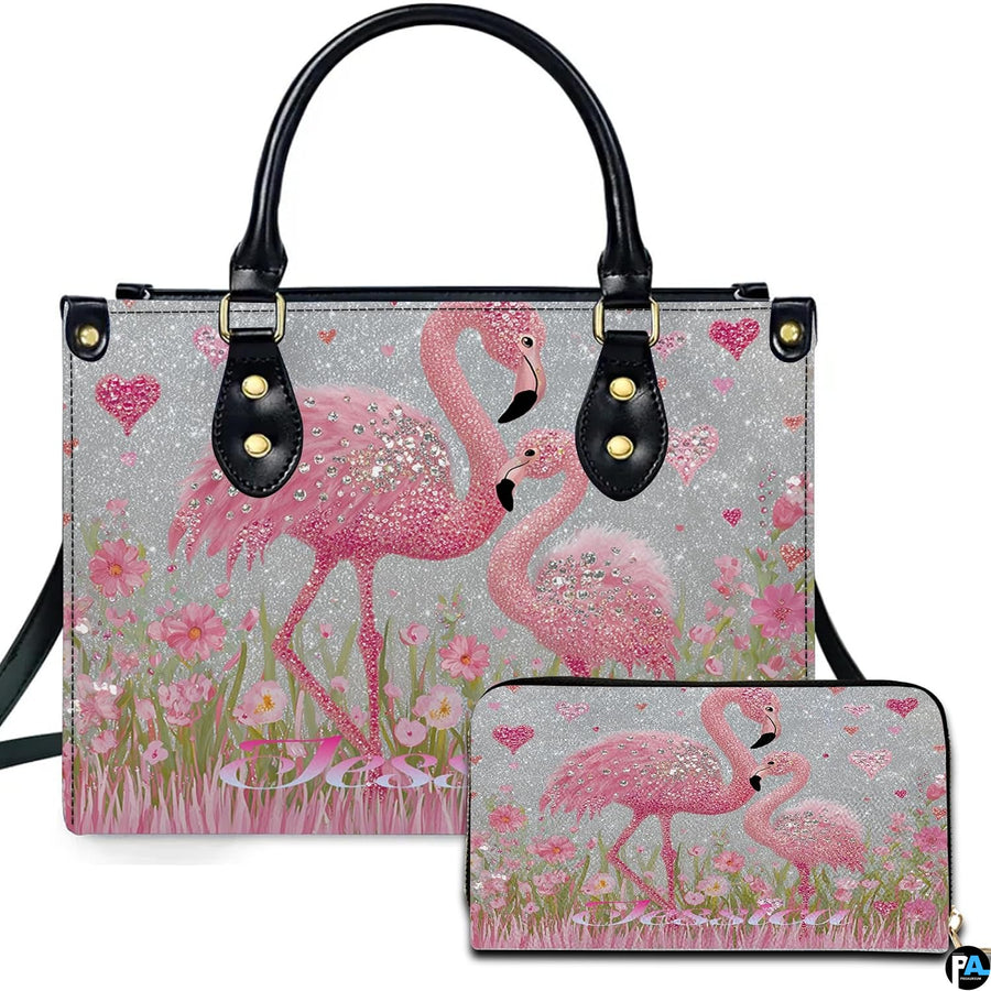 Front view of pink flamingo handbag and matching wallet set with sparkling crystal accents.
