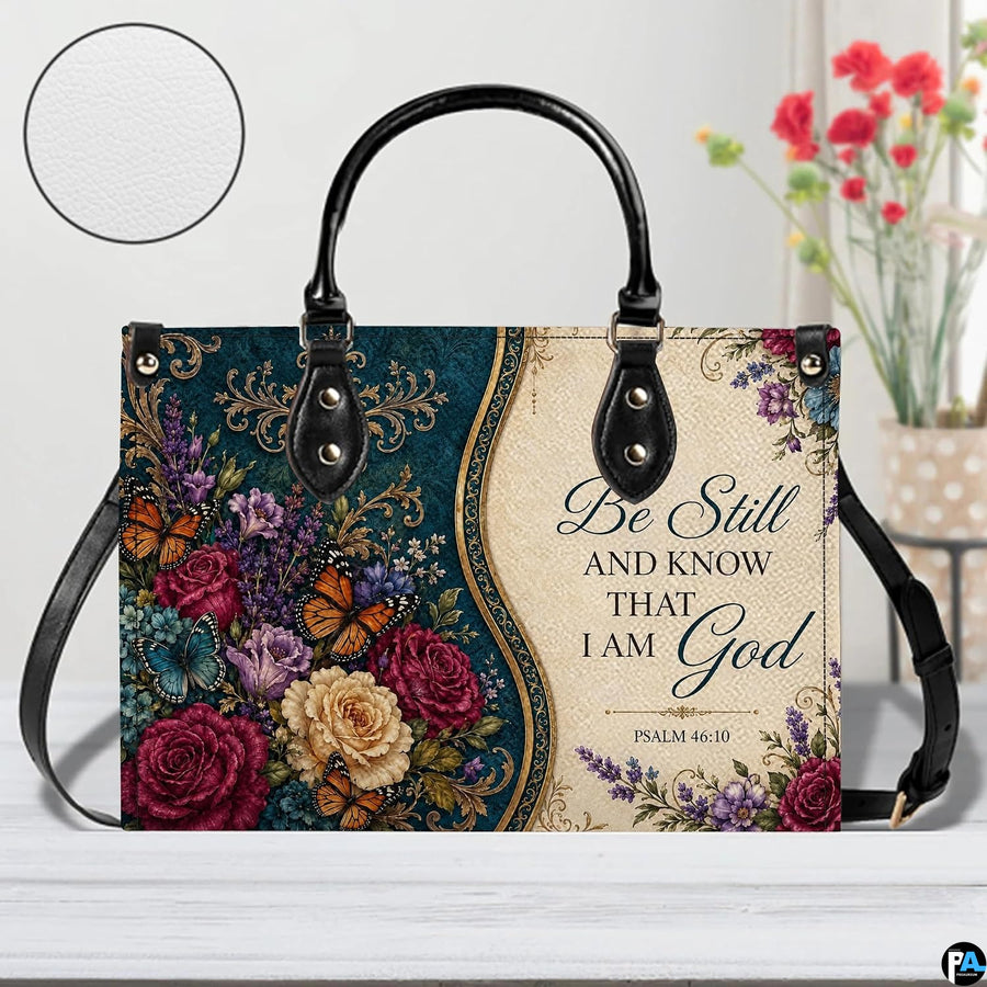 Top angle view displaying open interior layout and structured silhouette of teal baroque handbag.