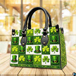 Angled green clover and top hat checkerboard handbag on a tabletop