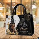 Angled perspective view of the praying woman Christian handbag resting on a wooden tabletop