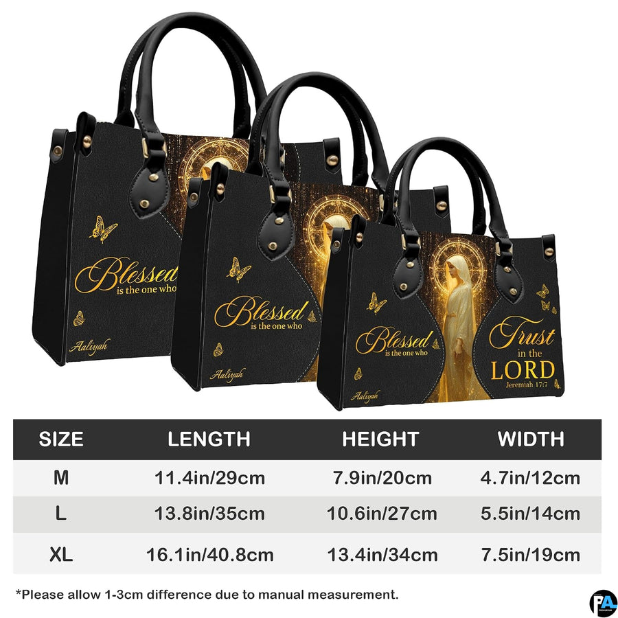 Coordinated set showcase of sacred golden halo handbag and companion wallet on plain backdrop.