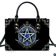 Gothic Wiccan silver pentagram sapphire handbag shown alone on white background.