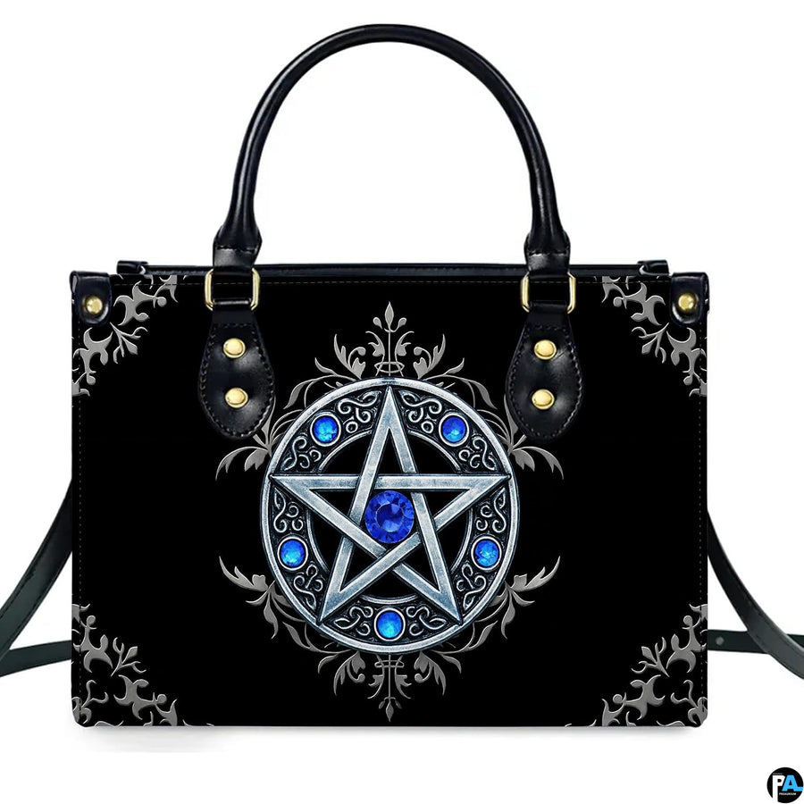 Gothic Wiccan silver pentagram sapphire handbag shown alone on white background.
