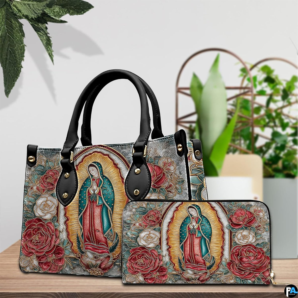 Matching handbag and zippered wallet set displayed together with Guadalupe art.
