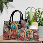 Matching handbag and zippered wallet set displayed together with Guadalupe art.