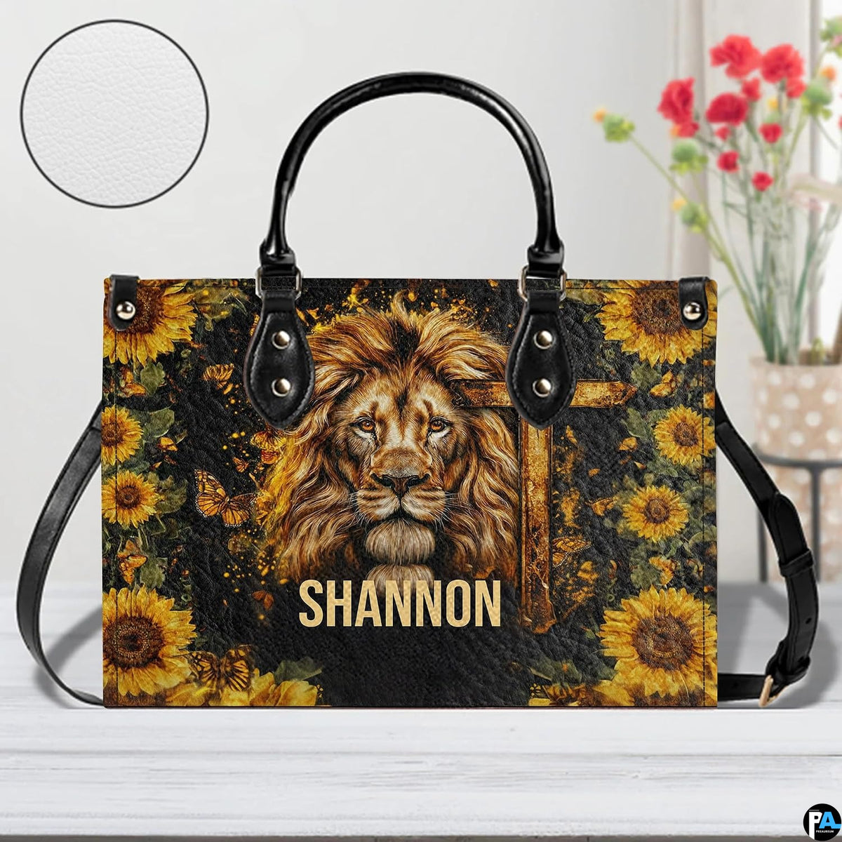 Front view of lion sunflower cross handbag showing noble lion portrait, wooden cross, and blooms.