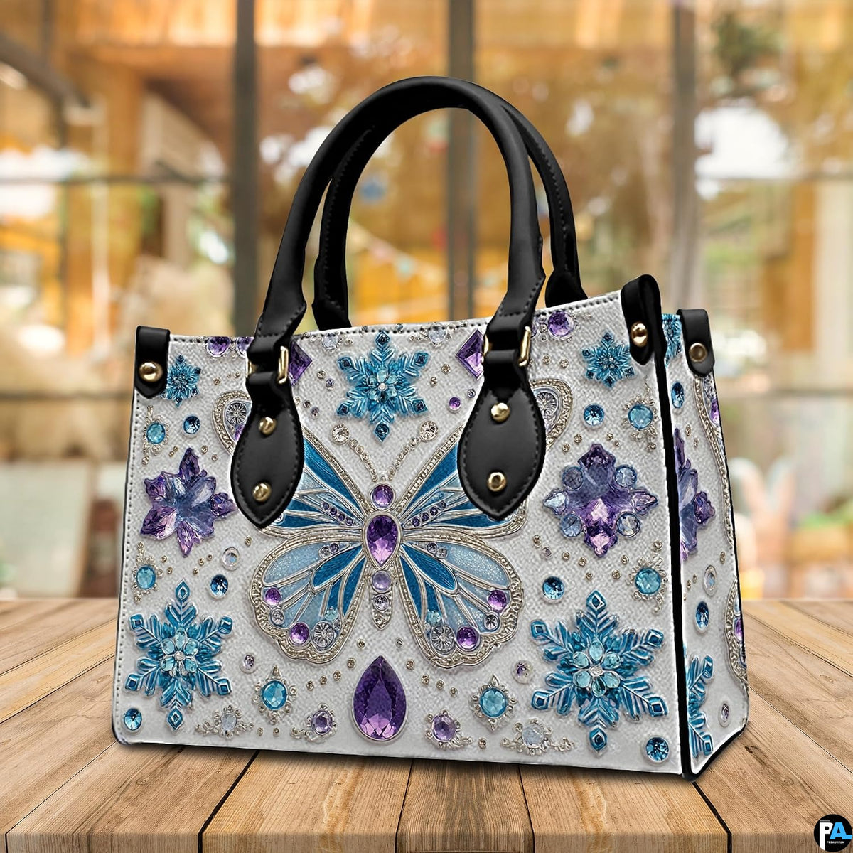 Top down view of butterfly handbag showing zipper closure and interior opening.