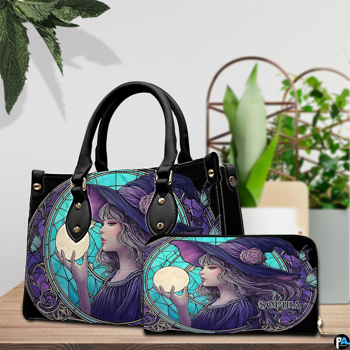 Angled tabletop presentation featuring the stained glass sorceress illustration on coordinated accessory surfaces.