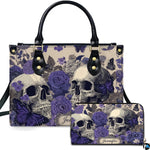 Gothic violet rose skull butterfly handbag and matching wallet set on white background.