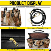Display panel detailing closure, handles, and compartment structure of the handbag