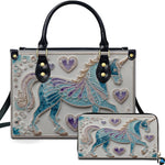 Turquoise filigree unicorn handbag and matching wallet set featuring trotting unicorn and purple hearts.
