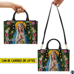 Demonstration of top handle and shoulder carrying modes for the Virgin Mary handbag