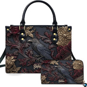 Gothic baroque raven floral handbag and matching wallet set displayed upright on white background.