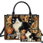Black white cat art display presenting fluffy tuxedo feline portrait framed by amber floral wood carvings.