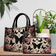Lifestyle tabletop view showing gothic black butterfly artwork placed beside decorative indoor house plants.