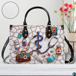 Contextual lifestyle display of the medical stained glass handbag in an interior setting.