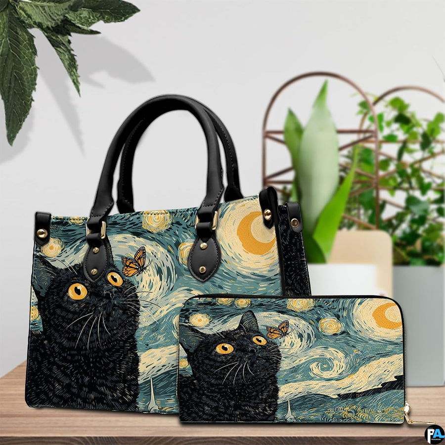 Starry night cat painting resting beside potted foliage on a rustic wooden surface.