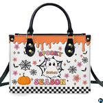 Studio portrait presenting cute ghost and harvest pumpkin artwork centered against plain white backdrop.
