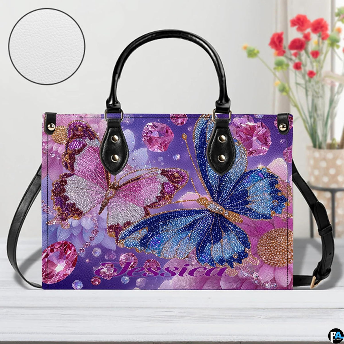 Perspective angle of the twin butterfly handbag highlighting print clarity and contours.