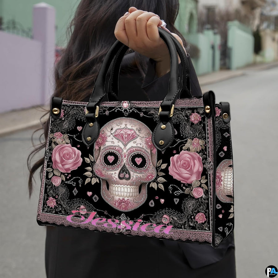 Side profile view showing structured silhouette and black carrying handles of the handbag.