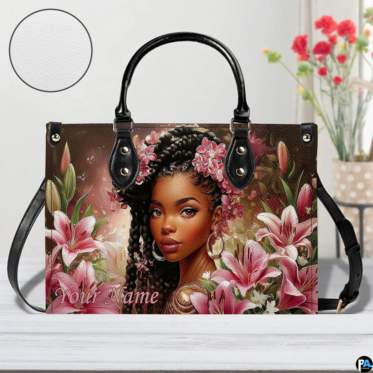 Artistic lifestyle display of the braided floral design on a tabletop beside red floral decorations.
