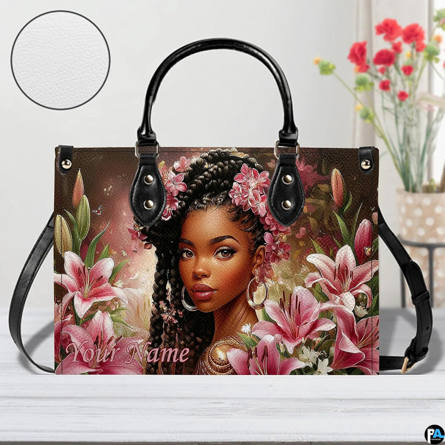 Artistic lifestyle display of the braided floral design on a tabletop beside red floral decorations.