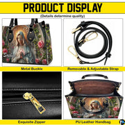 Full frontal perspective of matching Virgin Mary cathedral arch handbag and wallet