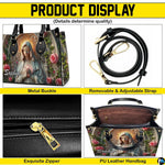 Full frontal perspective of matching Virgin Mary cathedral arch handbag and wallet