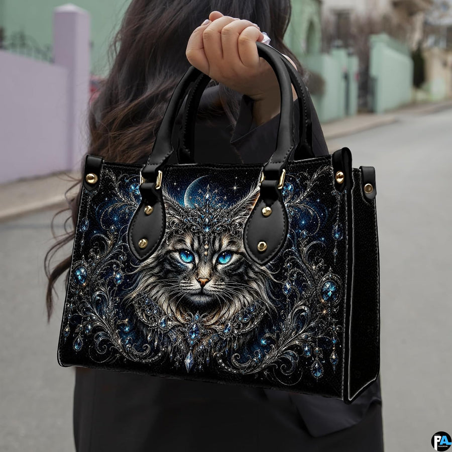 Outdoor presentation showing crowned cat artwork held while walking along an urban walkway.