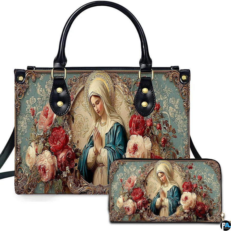 Front view of Virgin Mary rose handbag and matching zippered wallet with blooming floral frame.