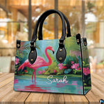 Side profile perspective of the handbag showing structured side panel and hardware.