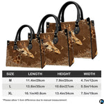 Coordinated arrangement of handbag and wallet displaying the matching giraffe artwork.