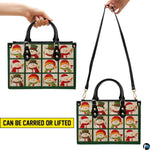Demonstration of handbag carried by dual black top handles and worn over the shoulder using long strap.