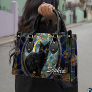 Outdoor model showcasing gothic stained glass black cat and moon mosaic artwork.