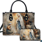 Our Lady of Lourdes handbag featuring Saint Bernadette grotto apparition painting.