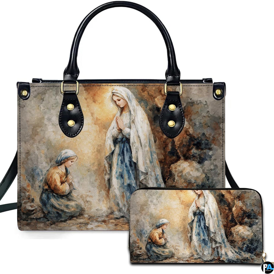 Our Lady of Lourdes handbag featuring Saint Bernadette grotto apparition painting.