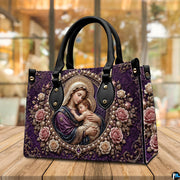 Purple Madonna and Child handbag displayed on wooden tabletop in a bright interior room