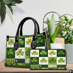 Green clover handbag with coordinated wallet displayed on a tabletop