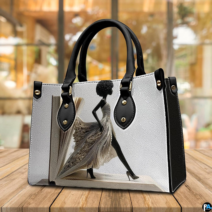 Angled book page dress handbag with afro silhouette and heels