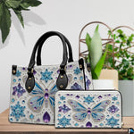 Back view of butterfly handbag displaying continuous light background with crystal snowflake detailing.