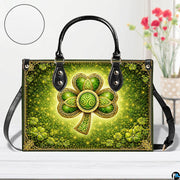Front view of green shamrock handbag with ornate gold border