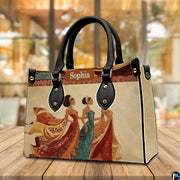 Angled cafe view of the structured African queen handbag resting on a polished wooden surface.