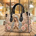 Alternative presentation of praying Virgin Mary handbag with floral baroque details