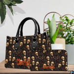 Angled tabletop view showcasing the coordinated botanical skull and red berry artwork across two accessory items.