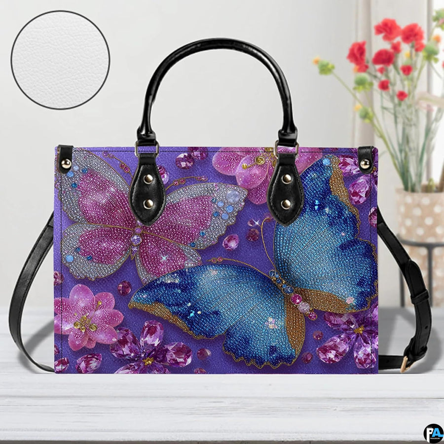 Side perspective of purple crystal butterfly handbag showing structured shape