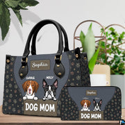 Angled display of puppy themed handbag shown with coordinating zippered companion wallet.