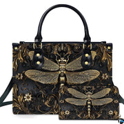 Studio display of gothic steampunk dragonfly handbag and matching wallet with antiqued gold filigree on black