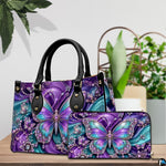 Lifestyle tabletop view showing purple and teal butterfly artwork placed beside decorative indoor house plants.