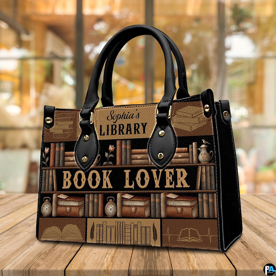 Three-quarter perspective view of vintage library handbag on a rustic wooden table.