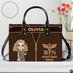 Chibi blonde nurse leopard handbag held outdoors showing visual scale against street setting.